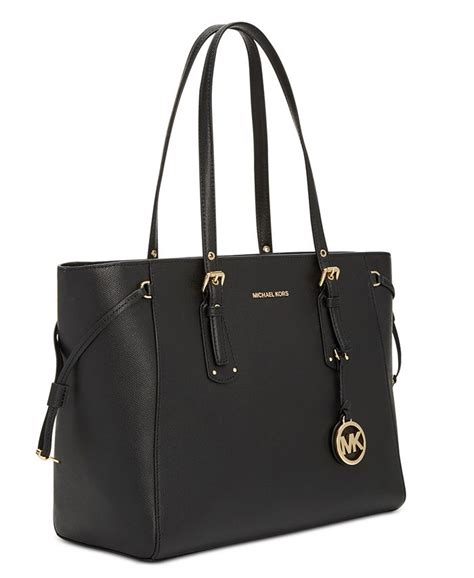 michael kors voyager medium east west multifunction top-zip tote fawn|michael kors voyager bag.